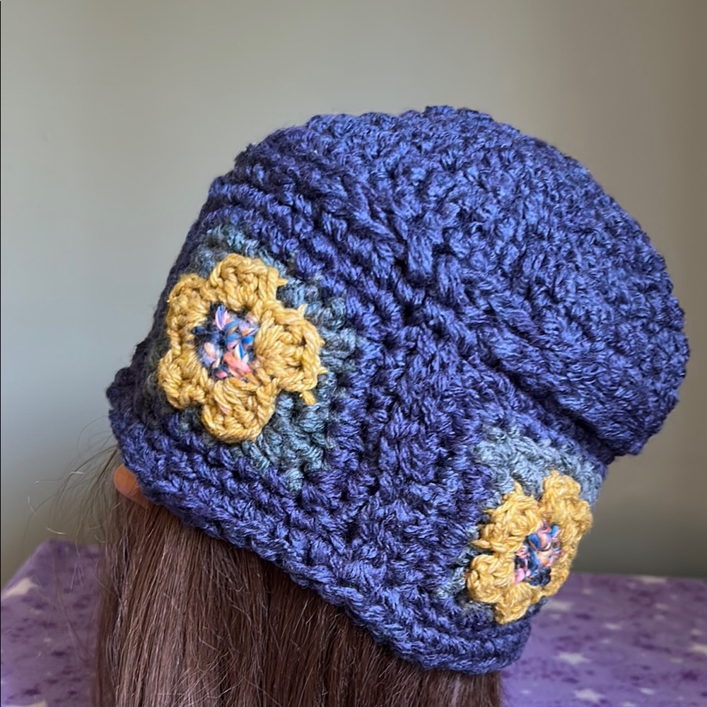 Elegant Blue Crochet Beanie with Yellow Floral Design soft wool medium